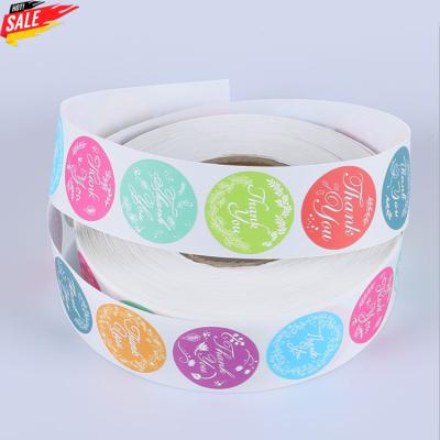 China Logo Design Service Customized Printing Heat Sensitive Round Roll Labels Stickers Adhesive Logo For Packaging for sale