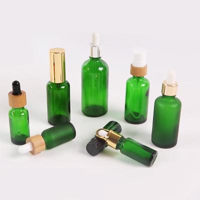 China Blue Green Brown Amber Clear Aluminum Dropper Essential Oil Glass Bottle All Size 10ml 30ml 50ml Personal Care Custom Color for sale