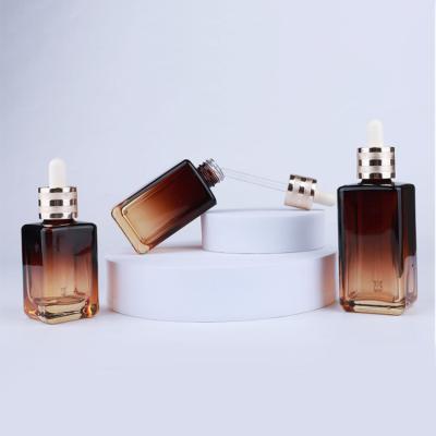 China 100ml Cosmetic Gradient Tawnish Square Dropper Bottle Essential Oil Essence Glass Bottle for sale