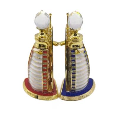 China 12ml Unique Style Arabic Gold Metal Stocked Attar Dubai Essential Oil Perfume Glass Bottles With Glass Stick for sale