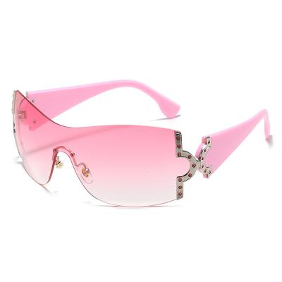 China Fashion Sunglasses Pink Uv400 Luxury Oversized One Piece Rimless Sun Lenses New Shape Diamonds Metal Temple Frameless Women Sunglasses 2022 for sale