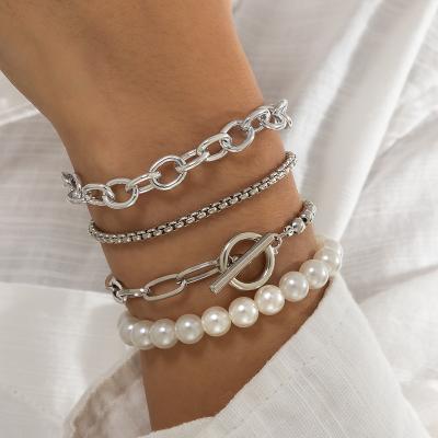 China Fashion Punk Jewelry Hollow Punk OT Buckle Simple Beaded Bracelet Set Women's Vintage Braided Bead Bracelet for sale