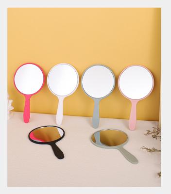 China Beautiful Personalized Mini Portable Colorful Handheld Round Cosmetic Mirror With High Quality ABS Plastic for sale