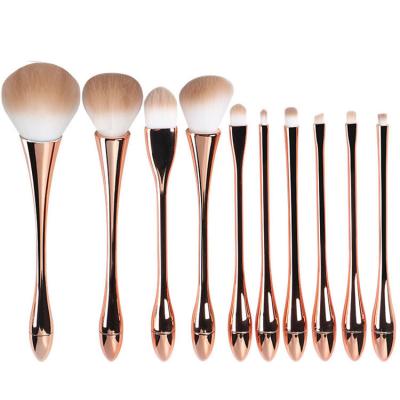 China Angular Blush Rose Gold Plating Plastic Handle Ergonomic Makeup Brush Set Luxury Makeup Brush Kit for sale