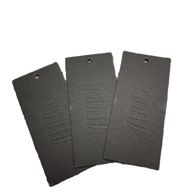 China Viable black card with logo embossed hang tag apparel label for sale