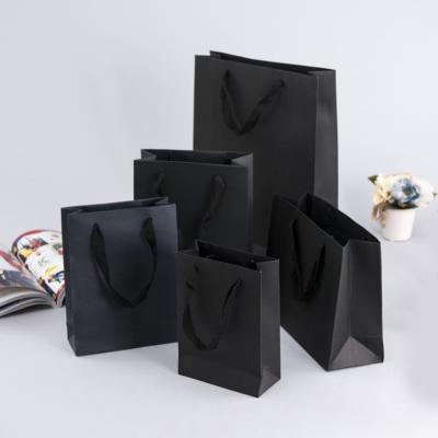 China Hot Selling Custom Kraft Paper Packaging Bags Recyclable Hang Gift Bag for sale