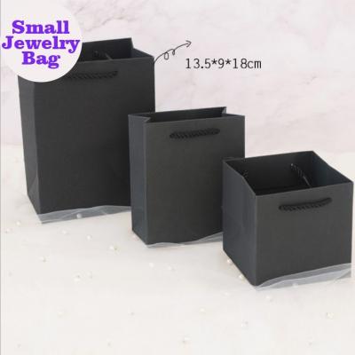 China Hot Sale 10pcs/pack Recyclable Jewelry Box Package Small Black Jewelry Paper Bag Gift Bag for sale