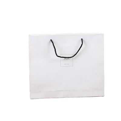 China Handmade Eco Friendly Biodegradable Custom Paper Gift Packaging Shopping Bag for sale