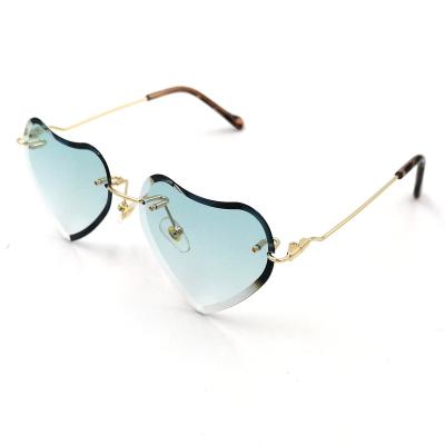 China 2020 Authentic Heart Brand Designer Rimless Sunglasses Gradient UV400 Heart Sunglasses Wholesale Clear Blue Light Anti Lens Sunglasses for sale