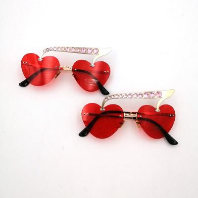 China New Arrival Small Girls Color Heart Shape Sunglasses Rimless Cherry Fruit Metal Sunglasses 2022 Kids Sun Glasses for sale