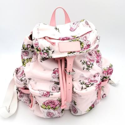 China Kids Raincoats Wholesale Strong Drawstring Raincoats Teenage Girls School Bags Pink Floral Girls Nylon Printing Backpack for sale