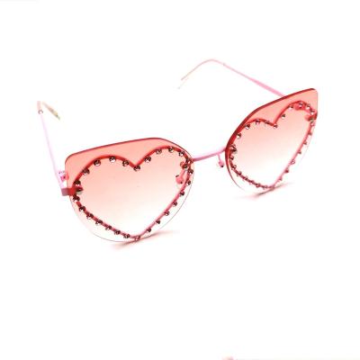 China 2022 New Arrival Little Girls Designer Metal Gradient Sunglasses Children Rimless Star Pentagon Color Heart Stones Diamond Sun Glasses for sale