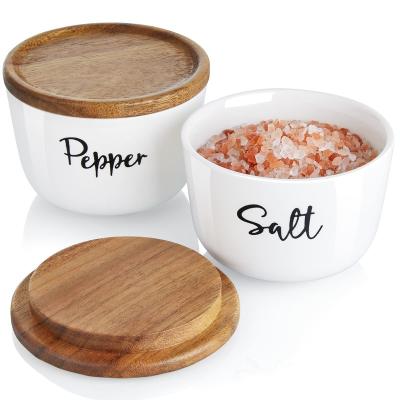 China Sustainable Custom Kitchen Salt And Pepper Cellar Set Ceramic Spices And Herbs Container Tool With Wooden Lid for sale