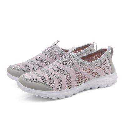 China Cool Summer EVA Low MOQ Flynit Mesh Slip In Sports Shoes For Woman for sale