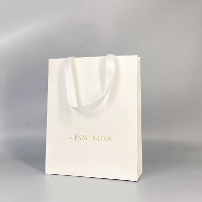 China Recycled Materials Logo Paper Bag Hot Stamping Customized Elegant Recycled Thank You Small Gift Bags For Retail Shopping for sale