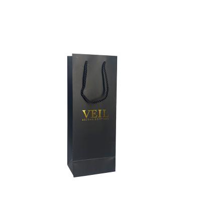 China Recycled Materials Stylish Customized Durable Wine Gift Bags Logo Printed Kraft Craft Cardboard Personalized Retailed Eco Friendly Paper Bag for sale