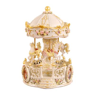 China Crystal Ball Merge with 3-Horse Music Box Carousel with Picture View, Resin Craft Desktop Ornaments Colorful LED Lights Carousel Music for sale