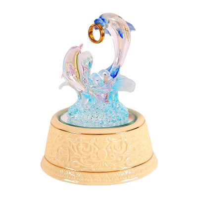 China Crystal Ball Fuse With Music Box Gift For Girlfriend Or Wife LED Color Brushed Craft Dolphin Love Theme Changeable Glass Music Box for sale