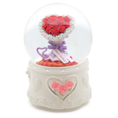 China The crystal ball merges with the floral bouquet Crystal Ball Clockwork Music Box Melody Castle European-style music box in the sky for sale