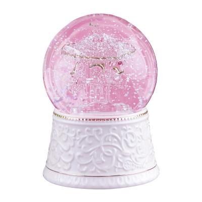 China Home Decorative Brushed Integrated Carousel Glass Process Crystal Ball Music Box for sale