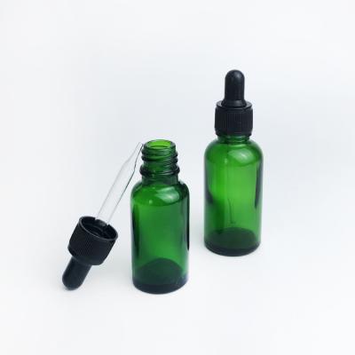 China Wholesale 30ML Cosmetic Green Round Dropper Bottle Essential Oil Glass Bottle Cosmetic IN RUNNING 1OZ for sale