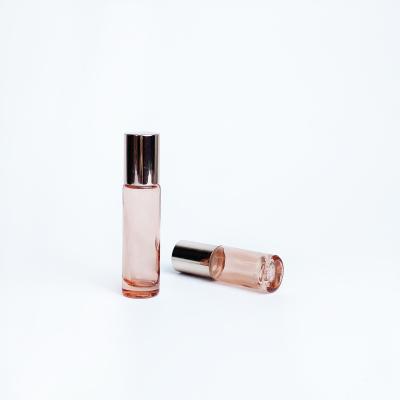 China 5Ml 10Ml Round Rose Gold Metal Roll Ball Cosmetic Clear Thick Glass Bottle for sale