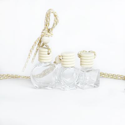 China Cosmetic Empty Luxury Car Perfume Bottle 10ml Car Air Hanging Perfume Bottle for sale