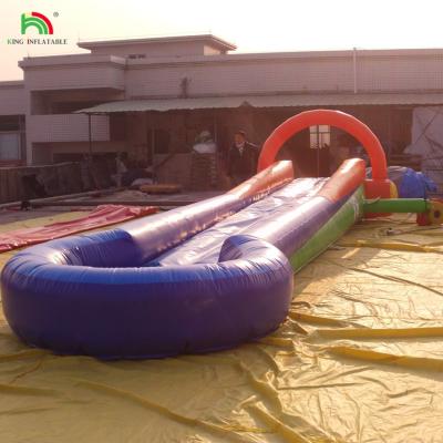 China Juego de agua inflable de una vía deslizamiento N deslizamiento de la ciudad deslizamiento con alfombra blanda deslizamiento de agua con piscina para el evento en venta