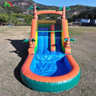 China 21x9x12FT Commercieel kwalitatief PVC Bounce House opblaasbare waterglijbanen Tropische glijbaan met splash Te koop