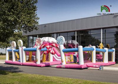 China Het commerciële Plato-Roze Candyland Opblaasbare Pretpark van pvc 10m met Dia Te koop