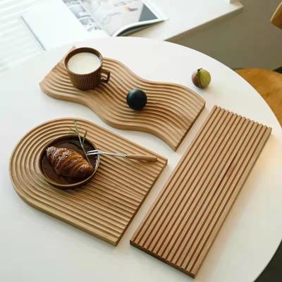 China Bread Dessert Tray Creative Geometric Design Wood Wavy Shaped Dessert Tray Cutting Chopping Board for sale