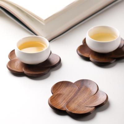 China Viable Creative Plum Blossom Shape Wood Handcrafted Coasters Insulation Protection for sale