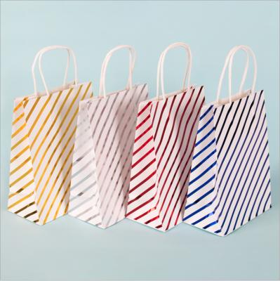 China Custom Recyclable Hot Stamping Kraft Paper Gift Bag Goodie Bags Party for sale