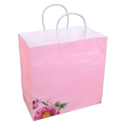 China Recyclable Kraft Paper Bag Gift Packaging Advertising Clothes Shopping Bag for sale