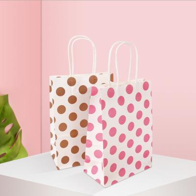 China Eco-friendly Recycled Materials Paper Bag Pure Color With Dots Flower Lipstick Shopping Kraft Bag for sale