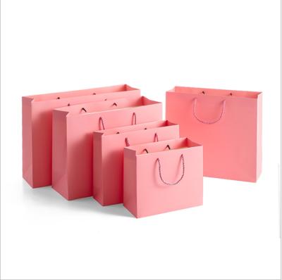 China Recyclable Customize Color Pink Handbag Clothes Gift Shopping Paper Bag for sale