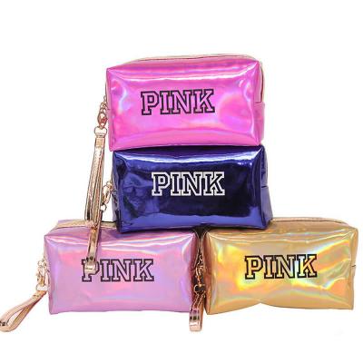 China Newest Fashion Design Solid Color Letter Printing Toiletry Bag Travel Toiletry Bag Cosmetic Bags Wholesale for sale