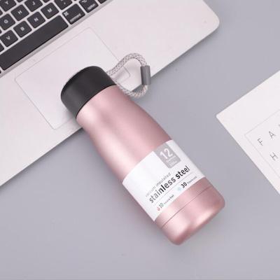 China Metal Business Cola Shape Reusable Double Wall Thermos Travel Hot Cold Water Bottle With Lid for sale