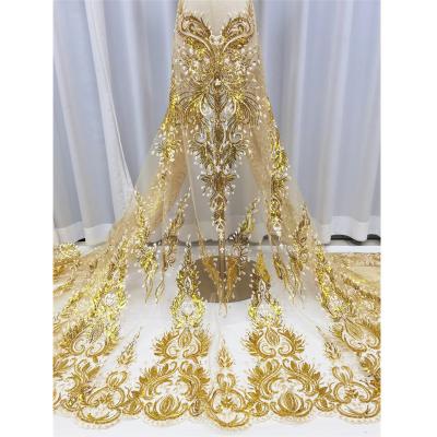 China Wholesale African White Heavy Beaded Luxury 3D Embroidery Lace Fabrics Wedding Dress Evening Dresses Tulle Lace Fabric for sale