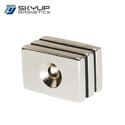 China Industrial Magnet N42eh Rare Earth Strong Neodymium Countersunk Block Magnet With Hole for sale