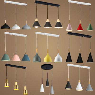 China Nordic modern simple creative colorful lampshade head lamp personality bar bedroom dining room style pendant light for sale