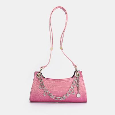 China New style retro fashion rainbow lady bag pearl chain pearl chain gradient below hand-held bag for sale