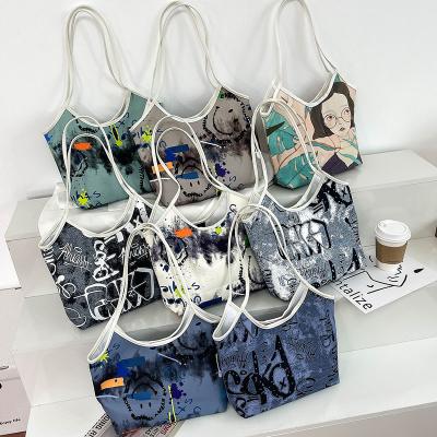 China Other wholesale purses and handbags 2022 handbags for women fashion graffiti canvas shoulder bag large capacity shopping bag for sale