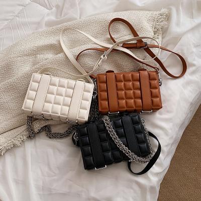 China Others Wholesale Handbags For All-match Solid Color Lattice Luxury Messenger Bag 2022 New Fashion Women Belt Decoration Bag Women for sale