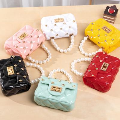 China 2021 High Quality Women Handbags Large Capacity Girls Pinch Girl Jelly Bag Silicon Purses Lady Bags Small Handbags For Girls for sale