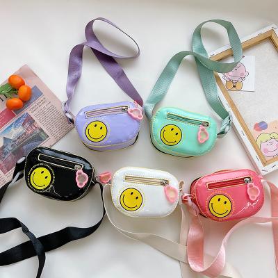 China Children Purse 2022 Wholesale Coin Purse High Quality New And Cute Smiling PU Designers Mini Cartoon Little Girls Handbag Girls Shoulder Purses for sale