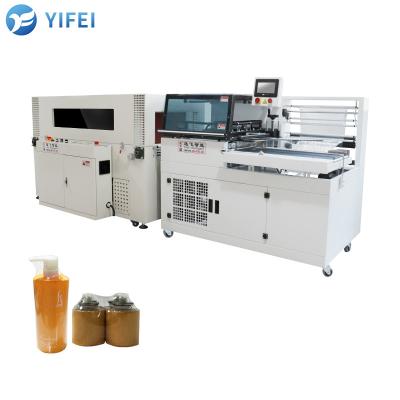 China POF/PVC Film 450L 1350W L Bar Shrink Film Bag Wrapping Machine for Packaging Solutions for sale