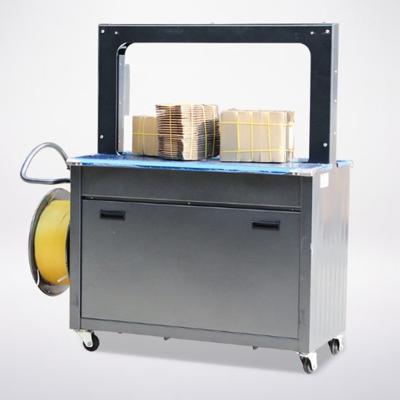 China Paper Packaging Material High Speed Strapping Machine with 0-50kg Adjustable Strength for sale