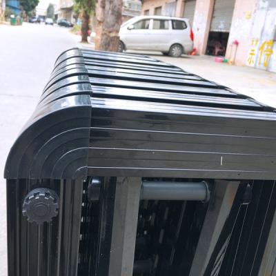 China Manual push and pull Manual Accordion Road Traffic Barrier Aluminium Alloy Outdoor Retractable Fence Road Barrier Folding Door Barricade Fence for sale