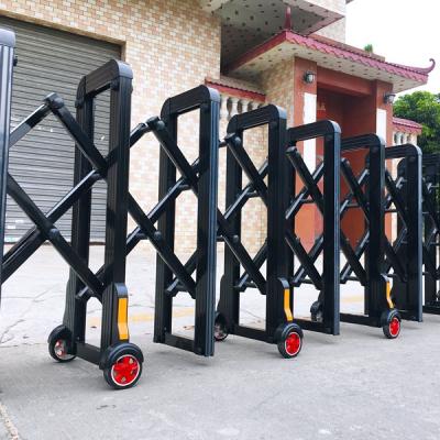 China Manual push and pull Portable Telescoping Plastic steel insulation expanding retractable Warning fences pvc safety road metal barriers for sale